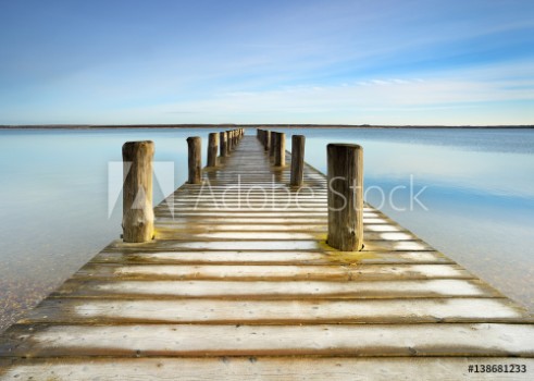 Picture of Wooden Pier with Hoarfrost leads into a calm clear lake